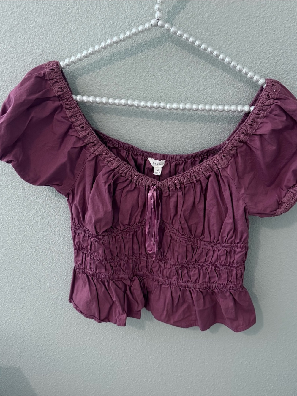 Smocked Off-Shoulder Peplum Blouse in Mauve